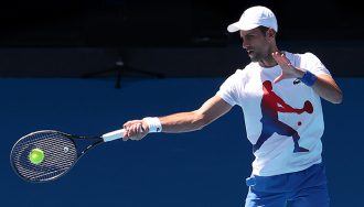 Novak Djokovic with Tennis Trophy