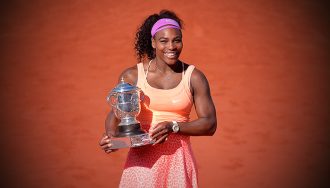 Serena Williams with Tennis Trophy