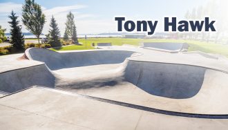 Tony Hawk next to skatepark