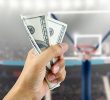 Gambler Placing Bet on Basketball