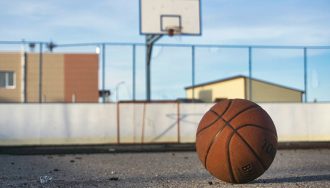 A basketball on a basketball court