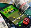 Mobile phone and money for sports betting