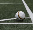 A football in a stadium corner